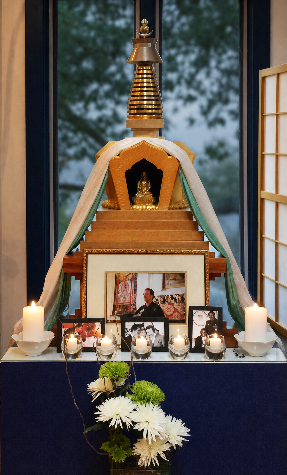 The Vajra Regent Ösel Tendzin memorial stupa illuminated by candles